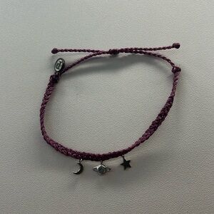 Purple adjustable Pura Vida bracelet with moon, planet and star charms